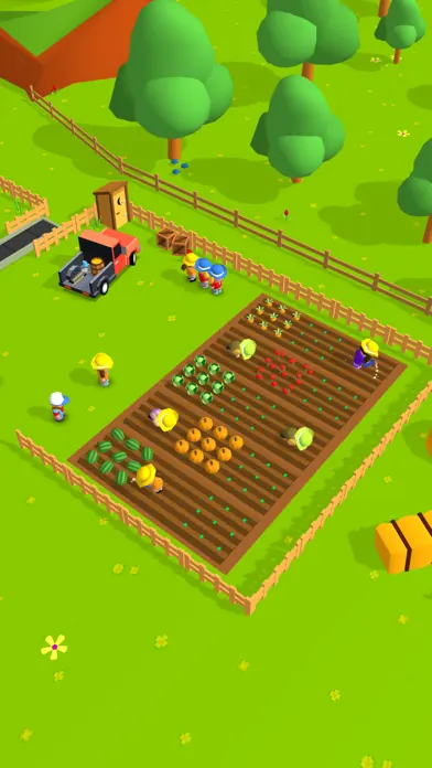 A field of crops beside a wooden fence on the farm